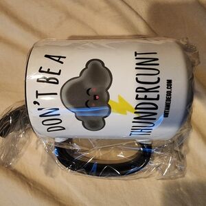 White Mug with Black Handle and Cloud Design